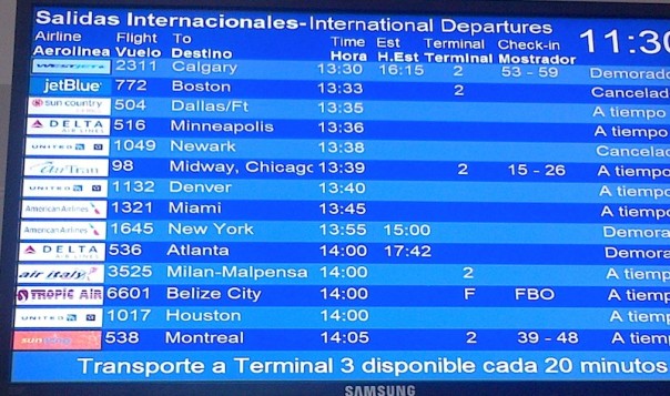 Il tabellone delle partenze con il volo delle 14 per  Milano 