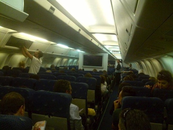 I passeggeri durante il volo verso l'Italia