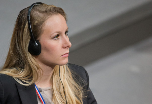 epa03550124 Grandaughter of the founder of the French Front Nationale Le Pen, Marion Marechal-Le Pen (FN), sits during a meeting of German and French parliamentarians at the German Bundestag in Berlin,†Germany, 22 January 2013. Celebrations are taking place for the 50th anniversary of the signing of the Elysee Treaty on 22 January 1963.  EPA/MICHAEL KAPPELER