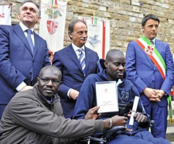 Moustapha Dieng, tetraplegico in seguito ai colpi di pistola sparatigli da Casseri