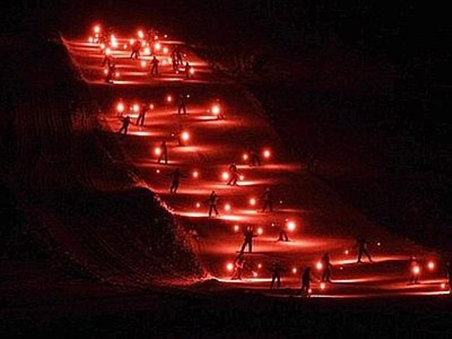Fiaccolata con gli sci