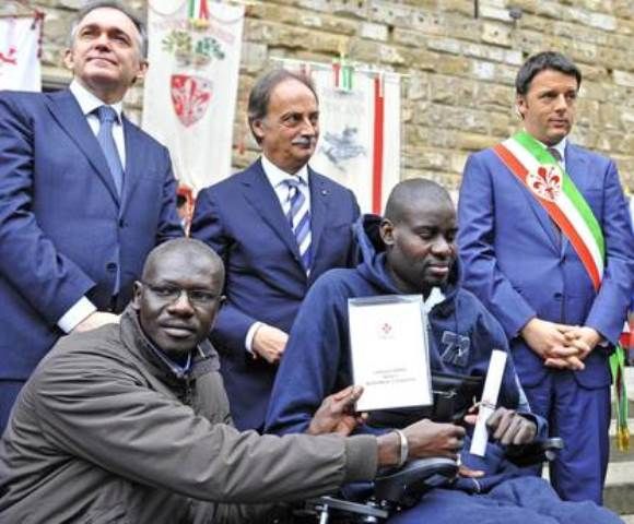 Moustapha Dieng, tetraplegico in seguito ai colpi di pistola sparatigli da Casseri